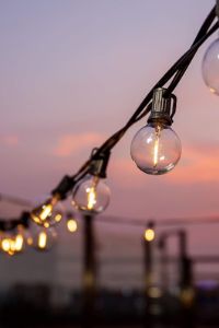 24 Enchanting Patio Lights String Ideas to Illuminate Your Outdoor Space 29 patio lights ideas Alyssa Germaine 15