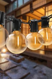 24 Enchanting Patio Lights String Ideas to Illuminate Your Outdoor Space 22 patio lights ideas Alyssa Germaine 6