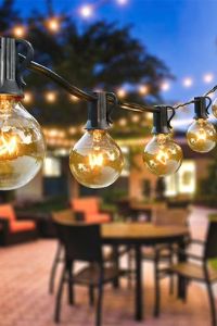 24 Enchanting Patio Lights String Ideas to Illuminate Your Outdoor Space 25 patio lights ideas Alyssa Germaine 9